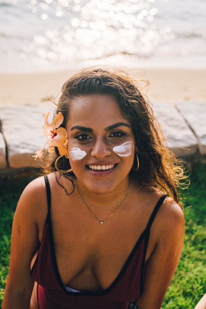 White Cream on the Woman's Cheeks