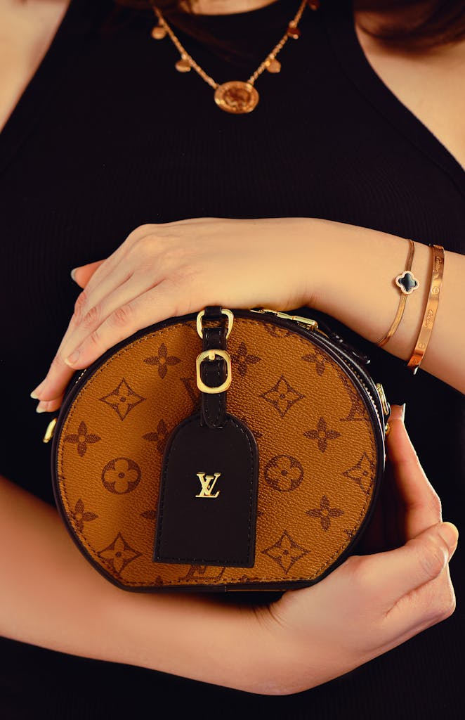 Woman Holding a Louis Vuitton Bag