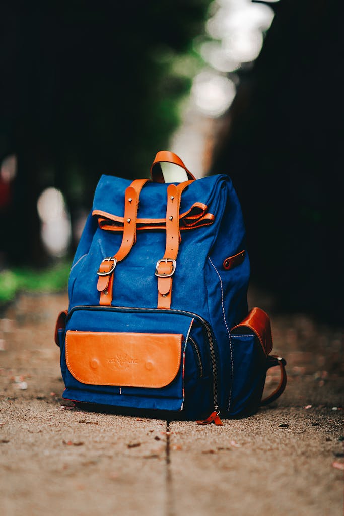 Blue and Brown Backpack on the Ground